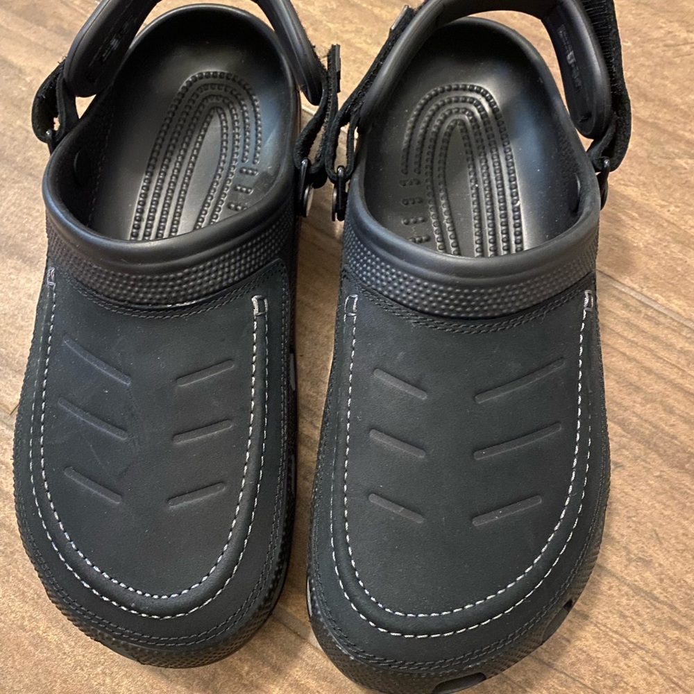 Crocs size 11 woman size 9 men